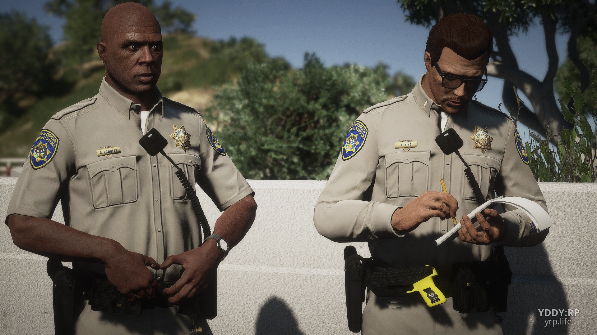 Photo of Two Officers Giving a Citation